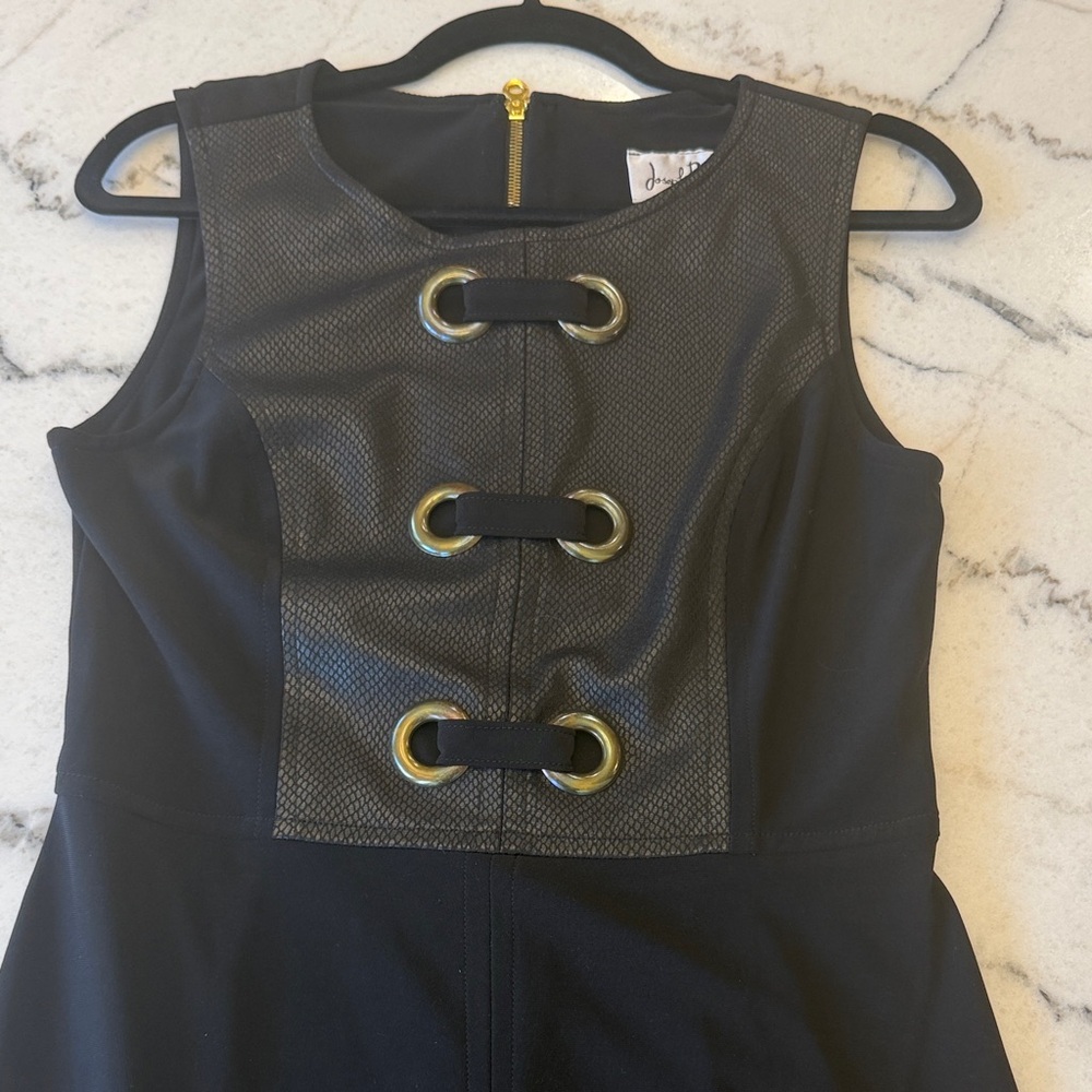 Joseph Ribkoff Black Dress with Faux Leather Bodice & Gold Grommet Details - Picture 2 of 5